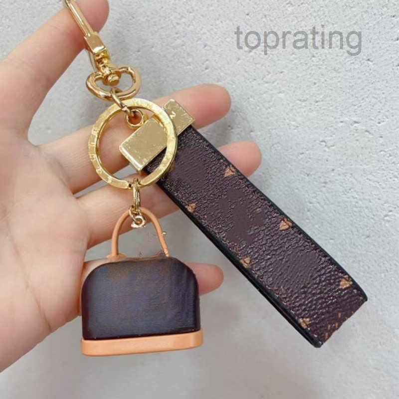 Keychains Buckle lovers Car Handmade Leather Keychains Men and Women bag Pendant Fashion Accessories Mini Handbags Charms Designer Leather Car Keyri