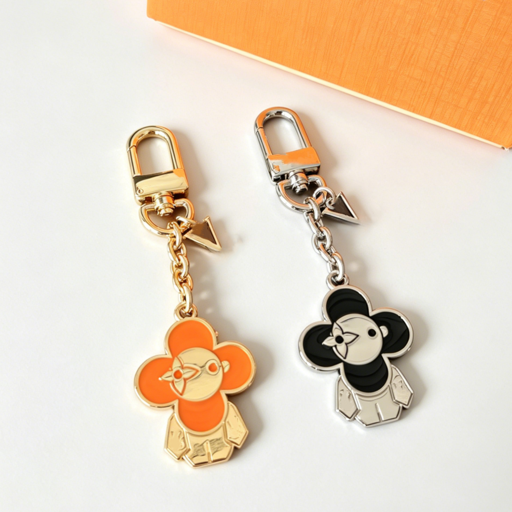Luxury Vivi Sunflower Mascot series bag decoration keychain Designer Enamel Keychain Gold Silver Alloy Flower Doll Key Ring for Women Handbag Pendan