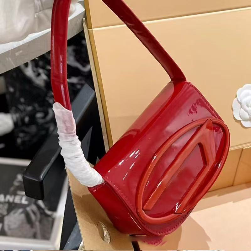Designer Bag Tote Bag 2026 New Niche Design Dingdang Bag Fashionable And Versatile Genuine Leather Womens Bag Handheld Underarm Bag Crossbody Small