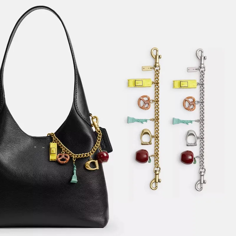 Porte-clés de luxe de haute qualité nouveau sac porte-clés suspendu décoration porte-clés lettre dinosaure style cerise porte-clés pour femmes et