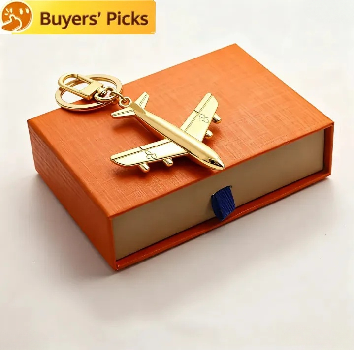 AAPorte-clés d'avion en cuir, chaîne classique, portefeuille de luxe de styliste, pendentif à breloque pour sac, cadeau de noël pour femmes et fi