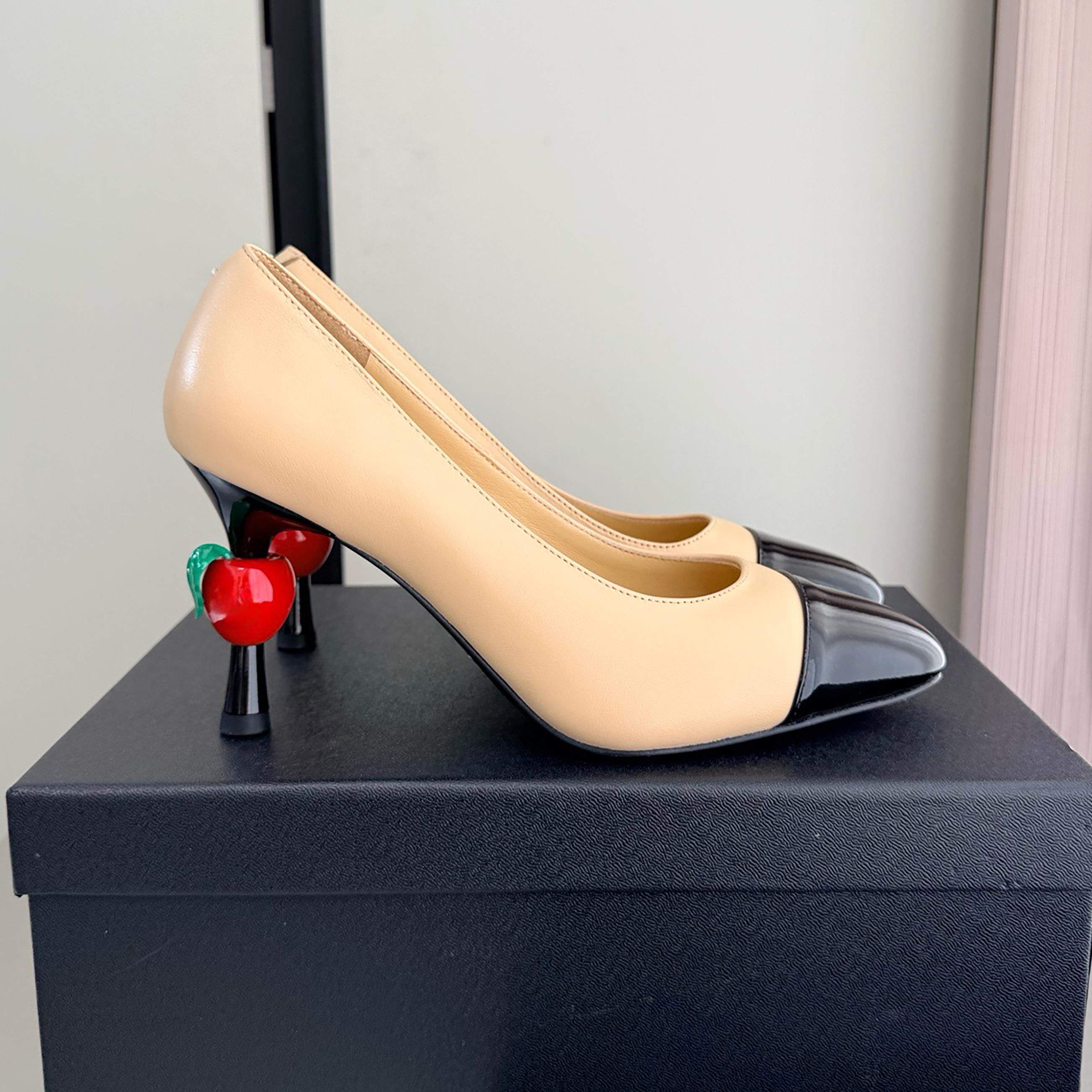 26 autumn and winter new apricot black color blocked pointed leather high heels cherry decoration fine heels women's commuting banquet temperam