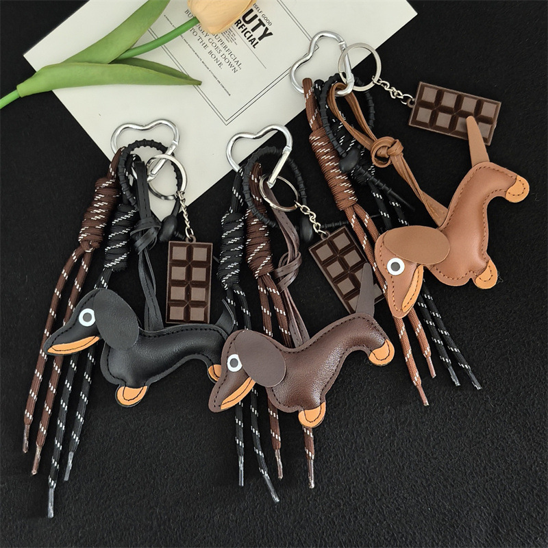 Cute Leather Dachshund Keychain Chocolate Charm Braided 2026 Rope 2026 Pendant Designer Retro Animal Backpack Car Hanging Accessory Designer Bag Cha