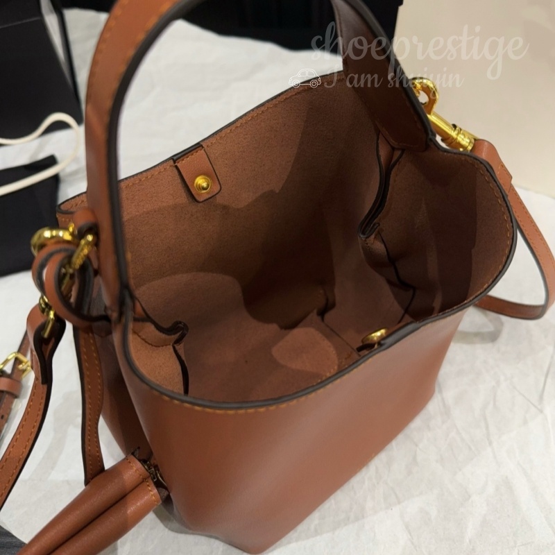 High end handmade genuine leather bucket bag crossbody bag designed by a senior designer perfect for women's dates weekend trips and street sty