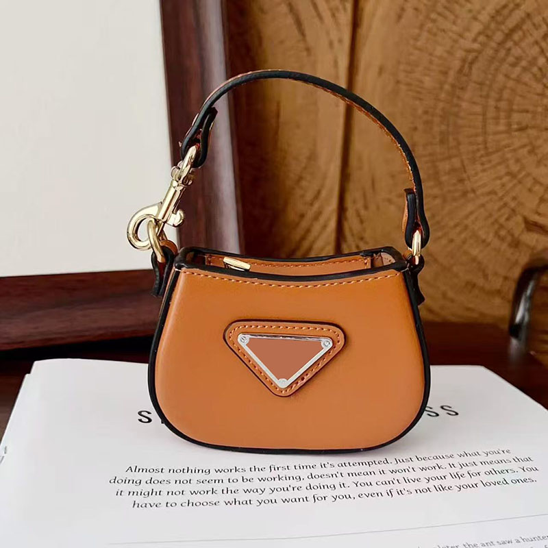 Designer Mini sac universel étui pour écouteurs de luxe en cuir PU TWS sans fil Bluetooth casque couverture téléphone charme rouge à lèvres porte