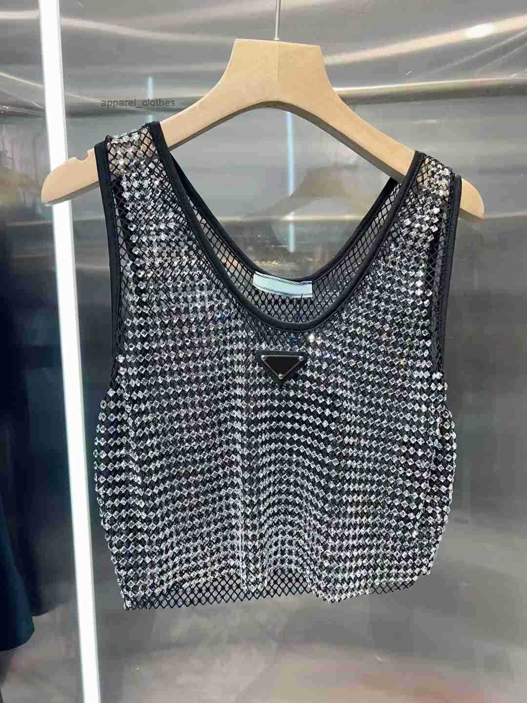 Womens Spring and summer round neck sleeveless hot stamping heavy industry shiny hollow elastic mesh European and American vest Tops