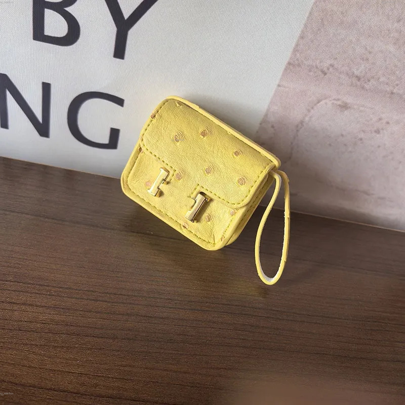 Porte-clés Mini sacs Porte-clés de créateur Lanières pour femmes Charme de sac Élégant Luxe Garniture en cuir Style rafraîchissant Porte-clés Ten