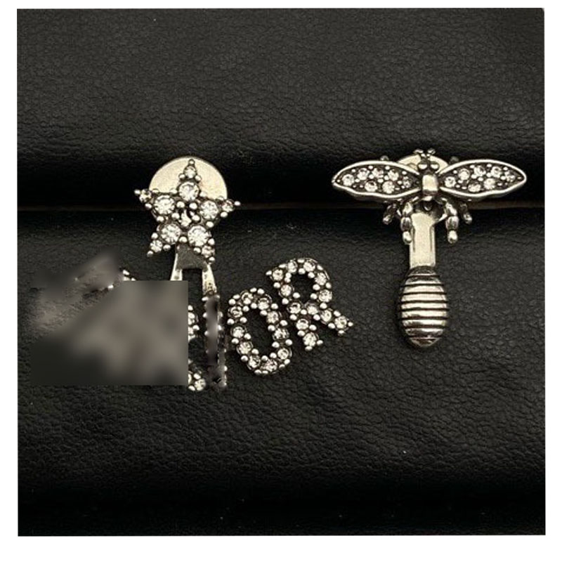 designer pour femme designer's - une nouvelle collection de boucles d'oreilles créatives et élégantes en forme d'abeille par la créatrice.