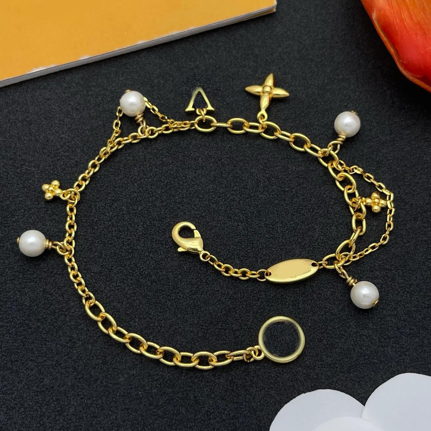 Bracelets de créateurs Luxe Perle Cristal Fleur Charme Bracelet Pendentif Or Argent Plaqué Gland Chaîne Bracelet Pour Homme Femmes Bohême Mode Bi