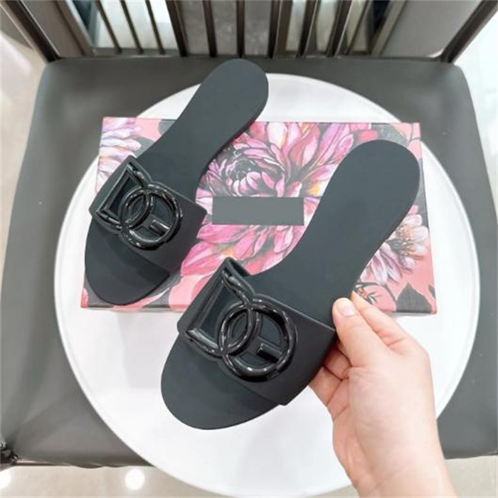 Sandali firmati Pantofole da donna Pantofole in gomma da donna Lettera scavata Piatta Spiaggia Gelatina Arancione Estate Autunno Ciabatte Sandali di