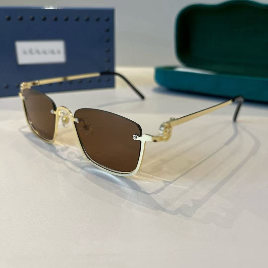 Nouvelles lunettes de soleil œil de chat version coréenne petite monture demi-monture en métal modèle classique amincissant avec pare-soleil rési