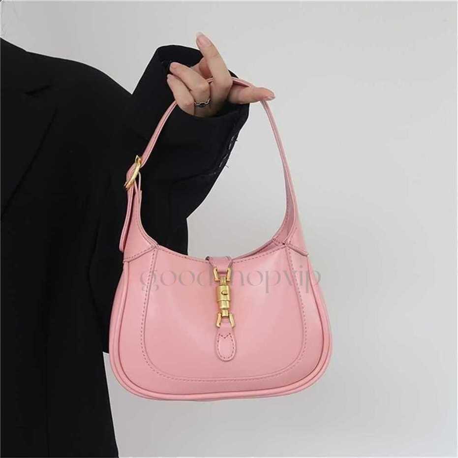 Designer Purses 1961 horse buckle Mini French underarm bag womens spring and summer texture niche saddle messenger Wear resistant design ins