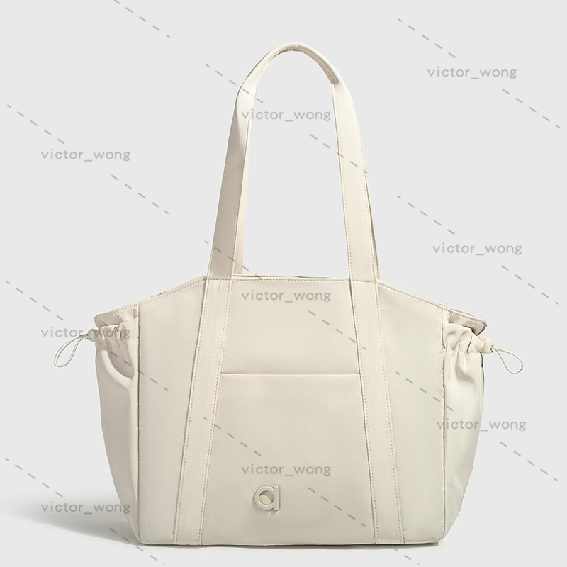 Designer Nylon Tote Bag: Large Capacity Casual Handbag with Drawstring Side Pockets Yoga Gym Bag Logo Detail