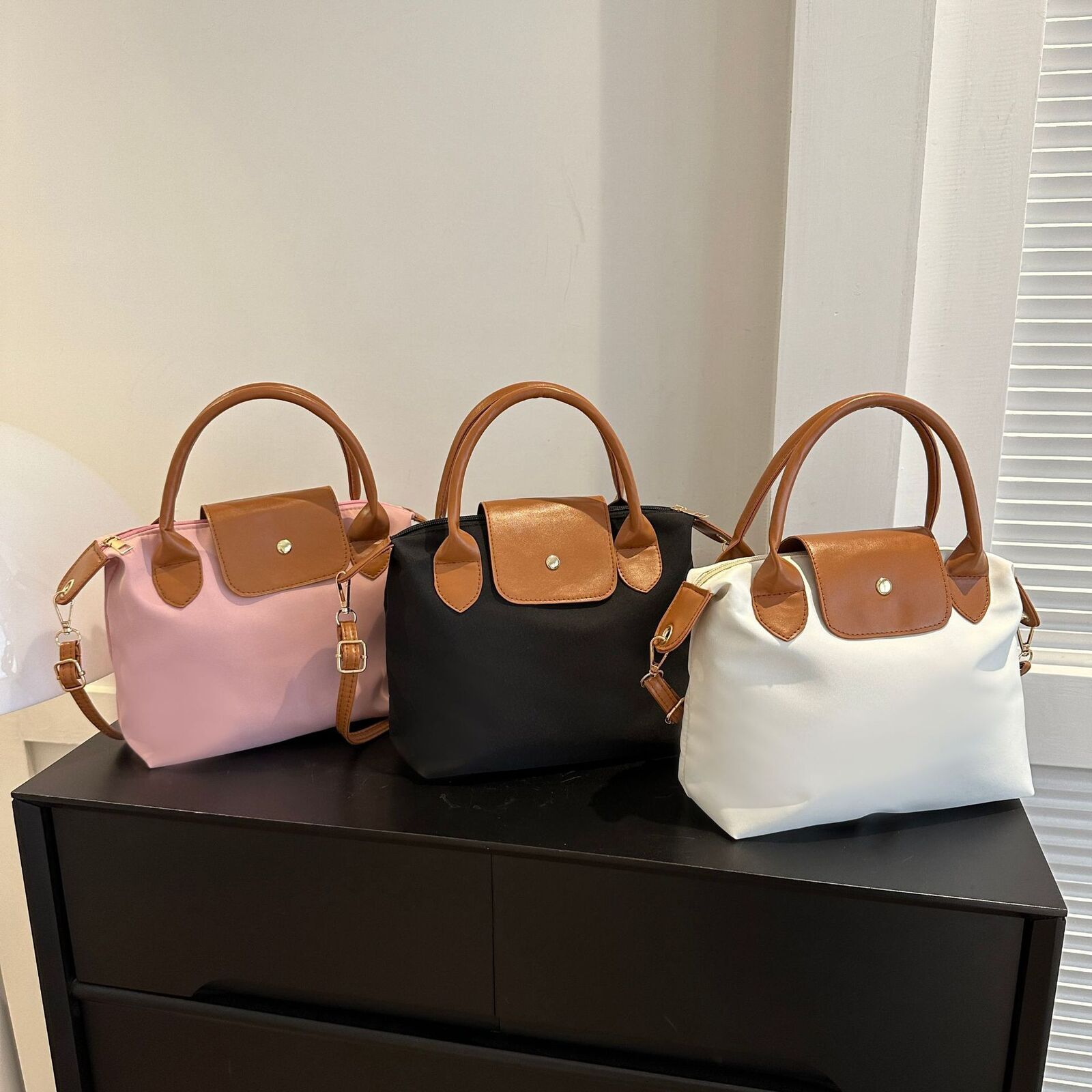 Fashionable personalized casual and trendy 2026 new large capacity nylon contrasting splicing hand-held single shoulder bag C260805