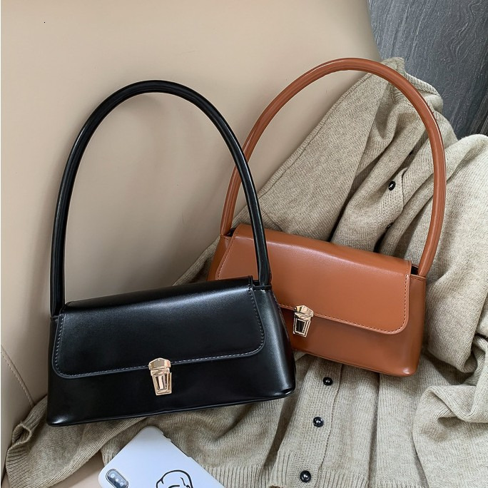 Popular women's bag autumn and winter French stick bag fashionable retro armpit bag versatile and atmospheric hand-held temperament shoulder ba