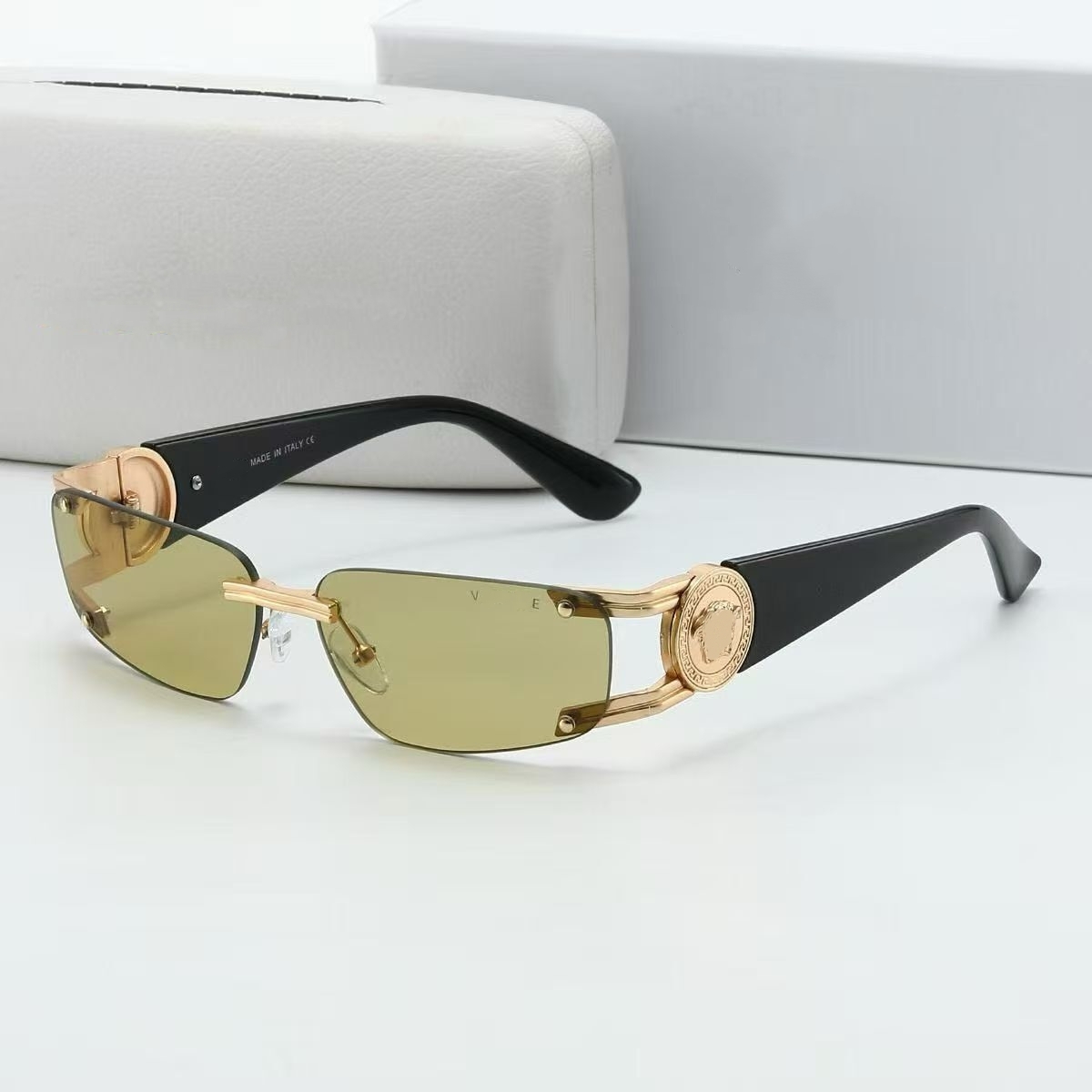Designer sunglass mens for womens classic cat's eye rimless beach shading polarized UV400 protection Glass luxury metal sun glass High quality