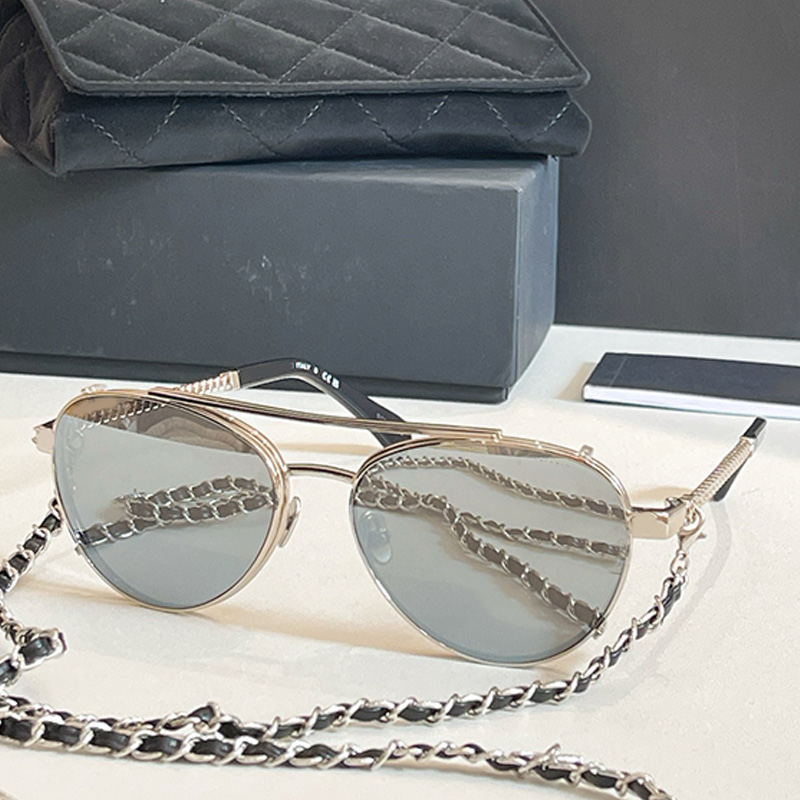 CH4292 New womens oval sunglasses luxury metal frame cowhide chain glasses mens pilot sunglasses womans outdoor party sunglasses UV400 protection