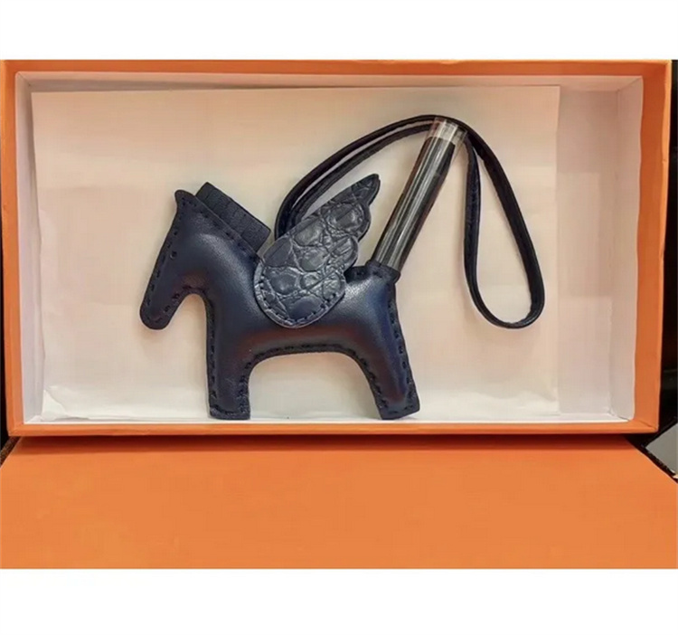 Porte-clés de luxe en peau de mouton et cheval, en cuir véritable, pendentif Nano Pegasus, en forme d'aile, sac à breloques de vol