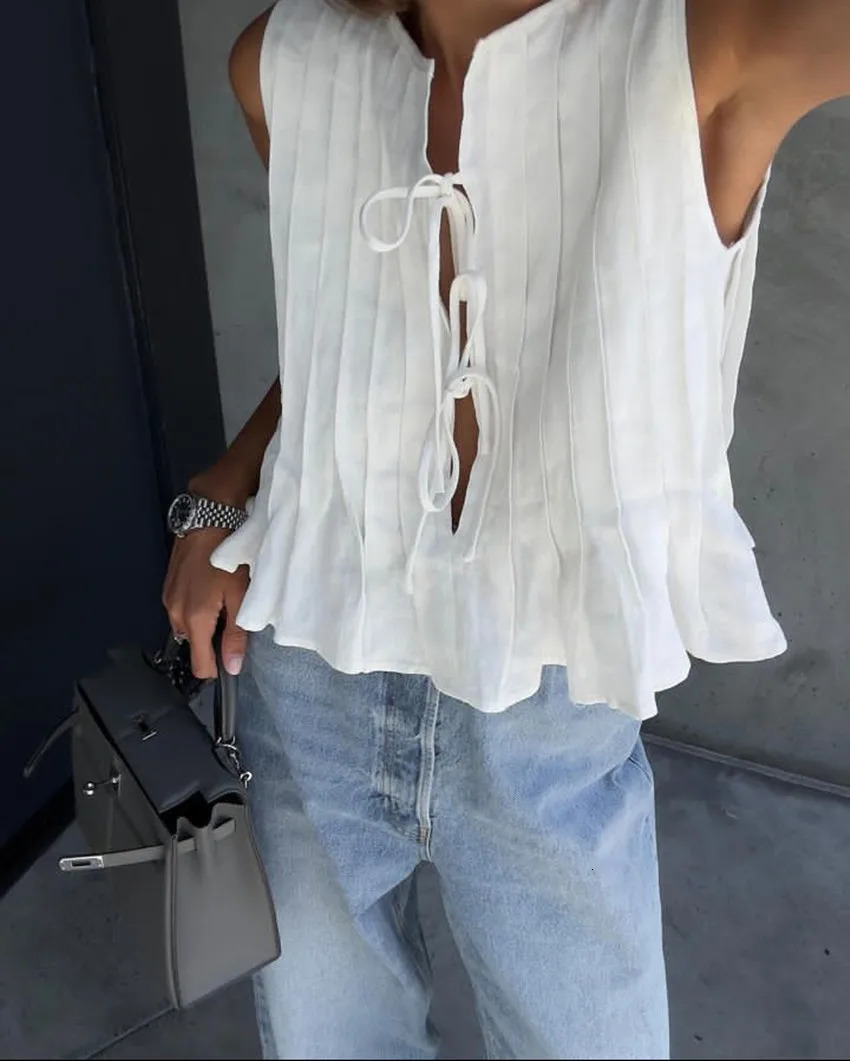 Fashion Bow Lace Up Shirts Women Cotton Linen Hollow Out Sleeveless Pleated Blouses Woman 2024 Summer Casual Lady White Tops 260423BANJIA