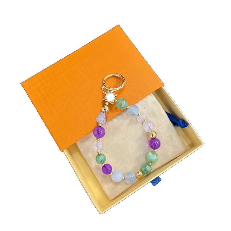 Luxury Designer Beaded Keychain Bag charms With Green Purple Stones Gold Tone Accents Elegant Daily Wear High Quality Gifts Stylish Accessory Bracel