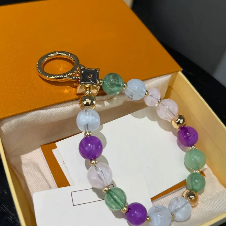 Luxury Designer Beaded Keychain Bag charms With Green Purple Stones Gold Tone Accents Elegant Daily Wear High Quality Gifts Stylish Accessory12