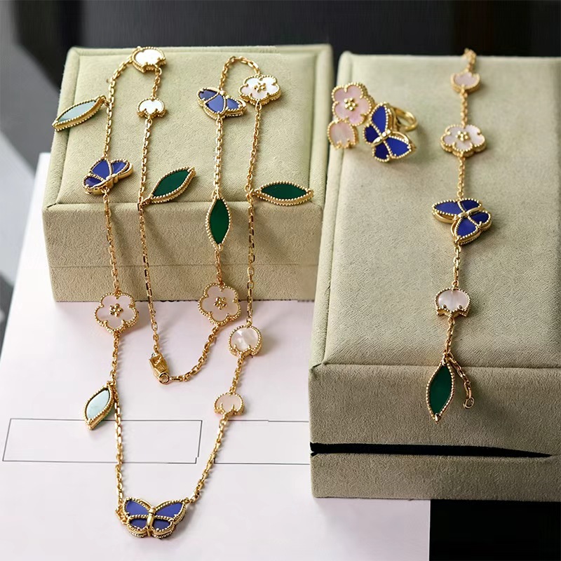 Nouvelle mode trèfle bague boucles d'oreilles Bracelet ensemble classique papillon mariage créateur bijoux pour les femmes