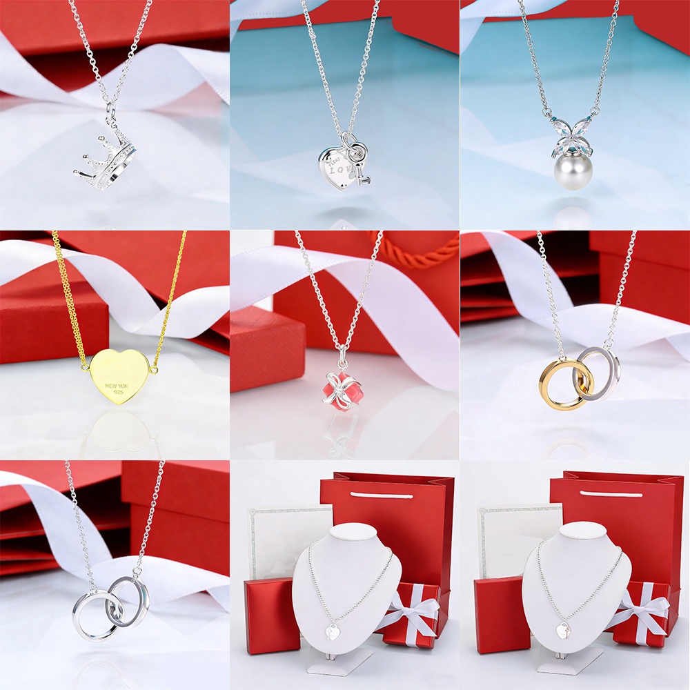 Collier de créateur pendentifs boîte cadeau pendentifs colliers de luxe en forme de coeur colliers clés colliers de perles papillon colliers à do
