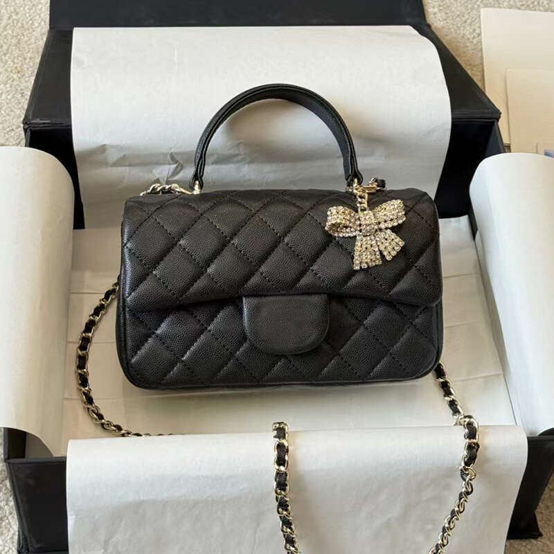Designer de luxe 25K Mini sacs à main avec pendentif en diamant arc élégant et chic sac à bandoulière en cuir de grain poignée de haute qualité s