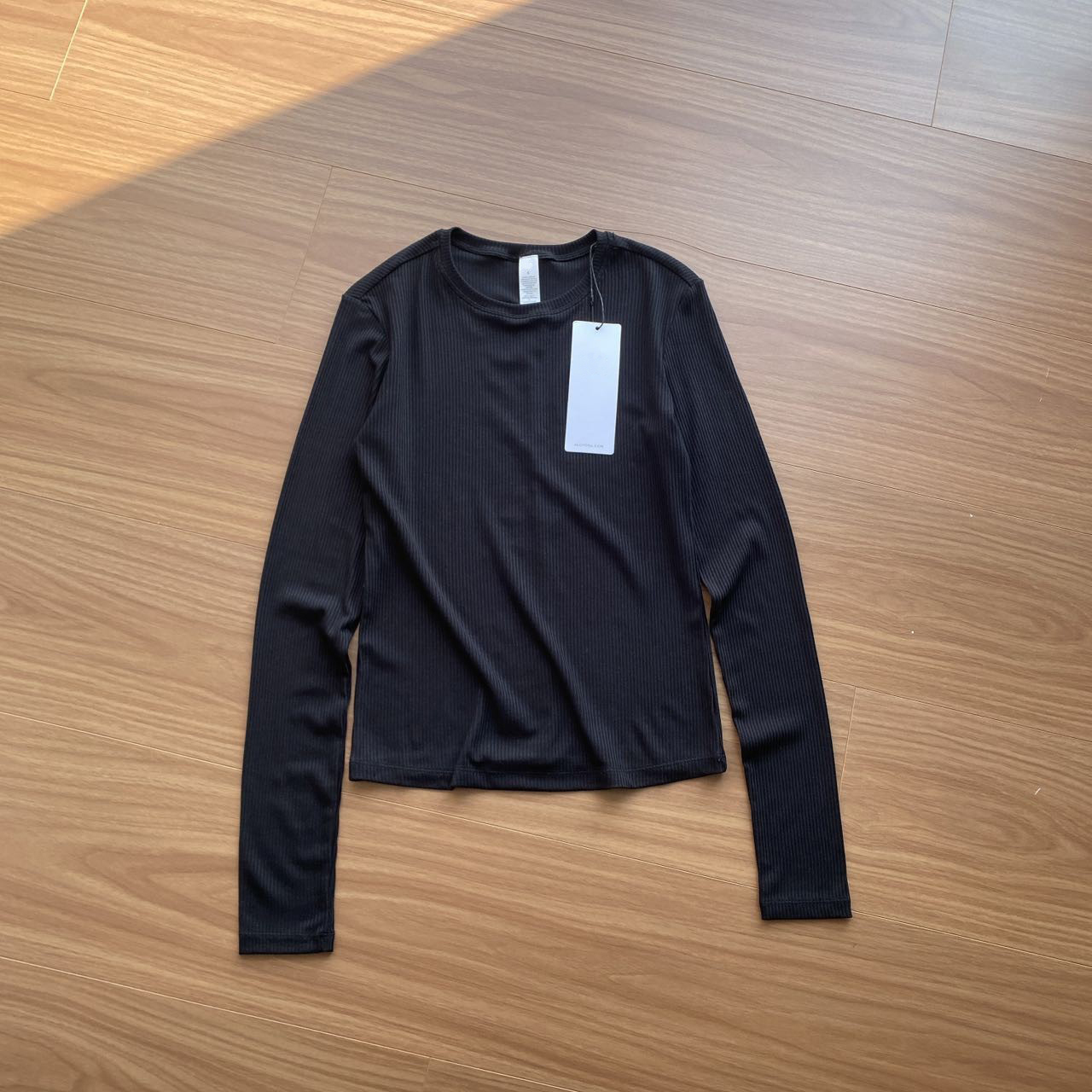 Côte de la mer côtelée à manches longues femmes haut col rond couleur unie Fitness Yoga chemise mince élastique basique t-shirt décontracté