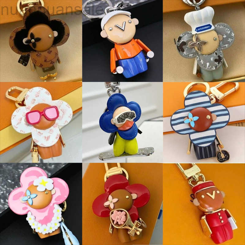 Keychain Luxury Designer Leather Bag Hangings Unisex Car Key Holders for Men and Women Sunflower Keychain Brand Pendant Steel Hardware with Couples