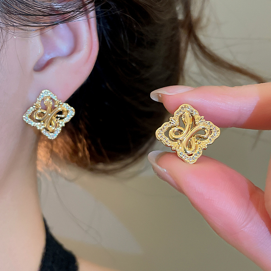 Silver needle zircon diamond-shaped hollow iris flower stud earrings, French vintage style, niche earrings with a light luxury and high-end feel-image-1095662998