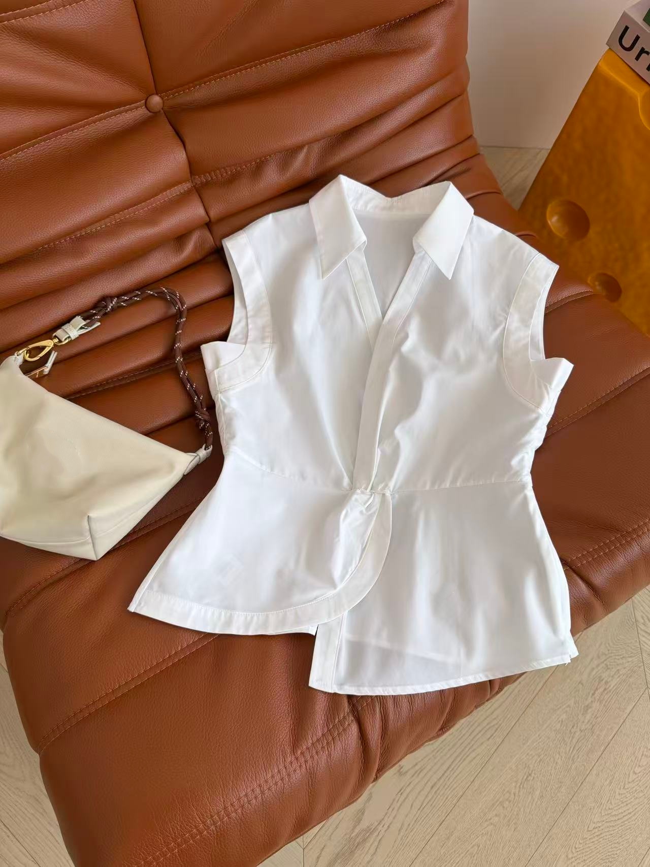 D Stylish women's blouse with an elegant silhouette, simple design and premium texture