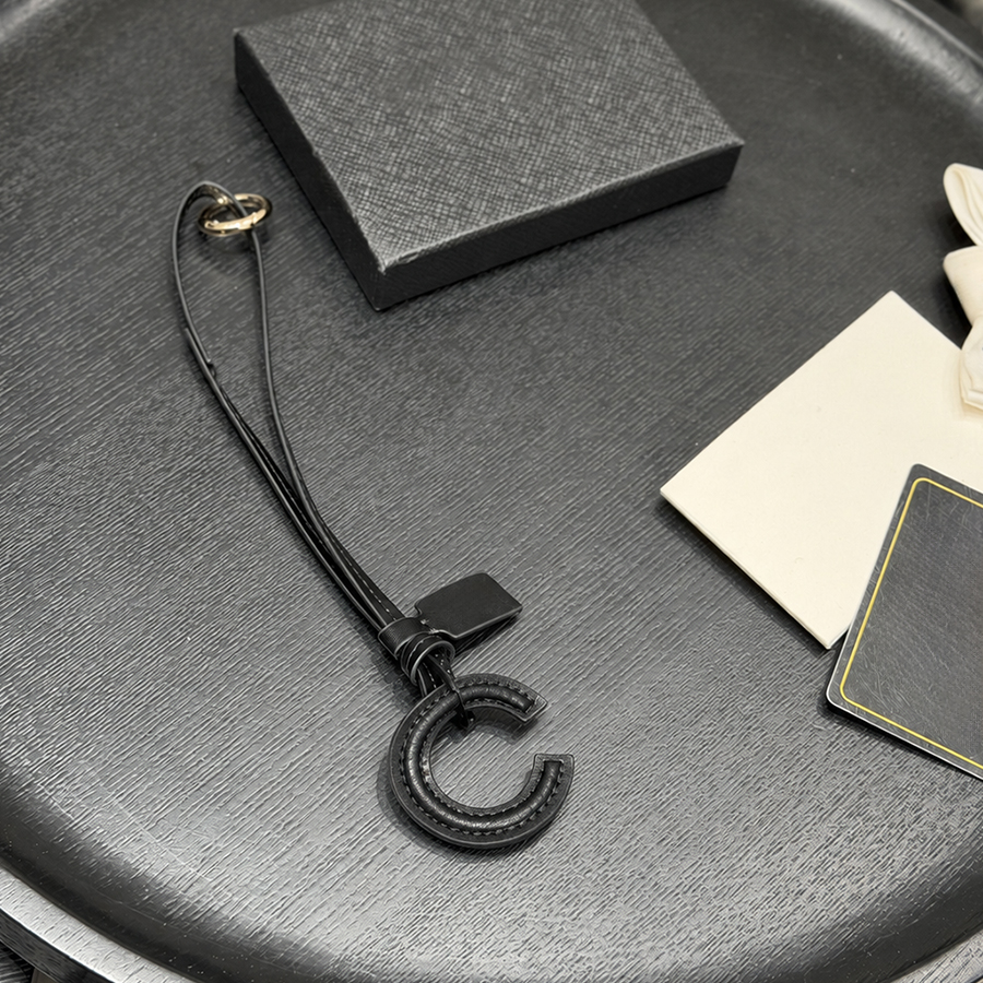 Porte-clés de créateur pour hommes et femmes, pendentif de luxe, accessoire de mode, porte-clés classique, longes, accessoires de voiture