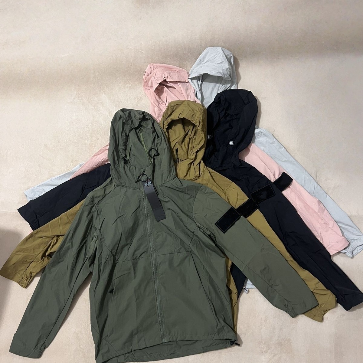 Men's Jackets Designers hooded coat islands Outdoor light weight stones Suns Clothing Couples Summer Clothes Sports Windbreaker Thin Outerwear