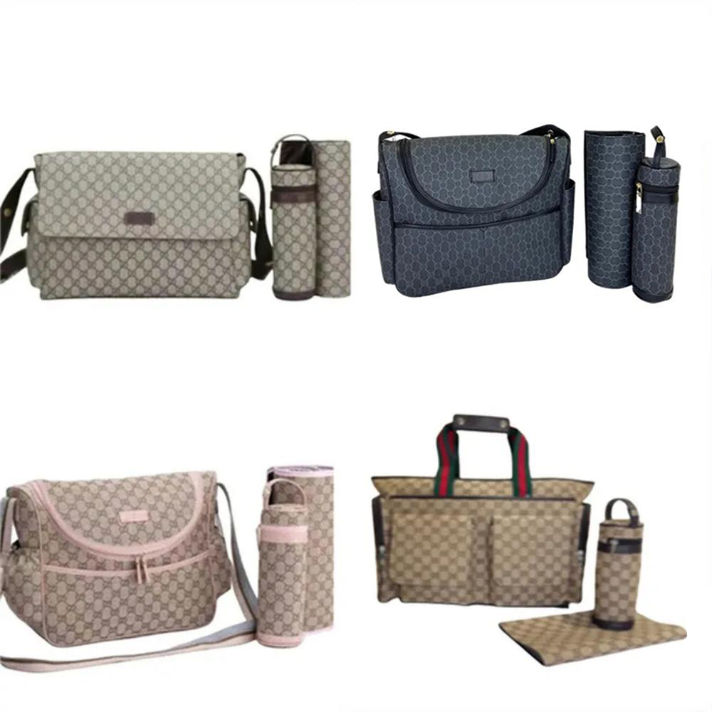 Sac à langer de luxe sac à dos design sac à langer pour bébé grande capacité couche à langer pour bébé en tissu en nylon sacs fourre-tout momie s