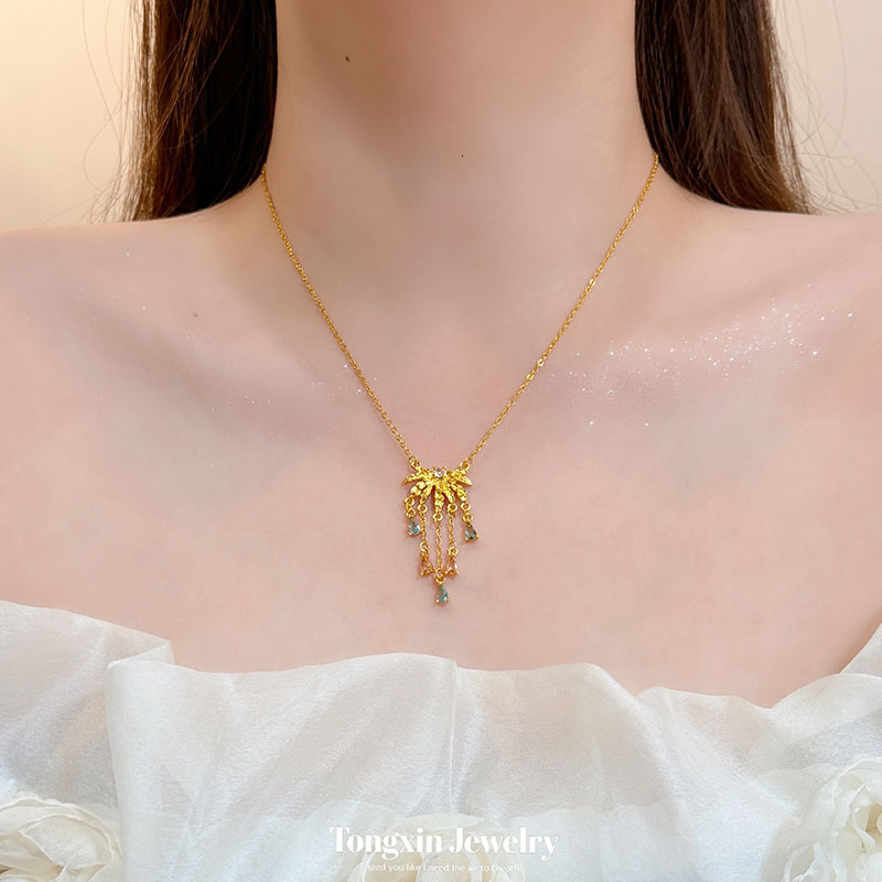 Elegant gold-plated blue water drop tassel with diamonds, exquisite and high-end luxury necklace