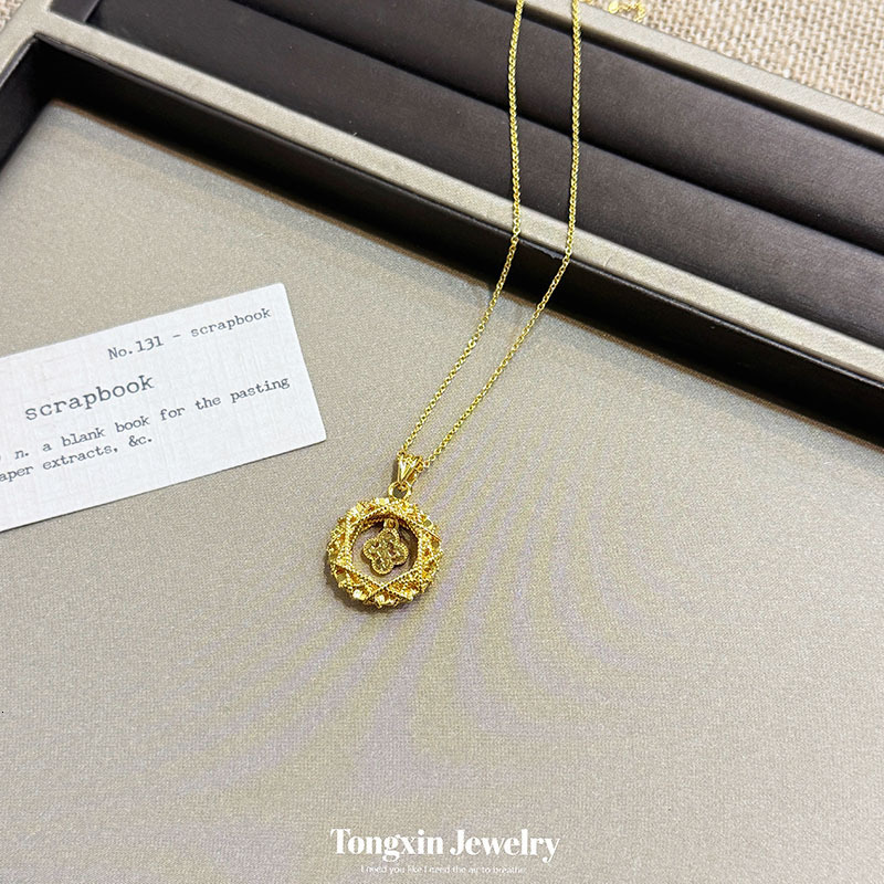 The same style as in the jewelry store: gold-plated hollowed-out dreamcatcher four-petal flower necklace, offering a light luxury and high-end feel,