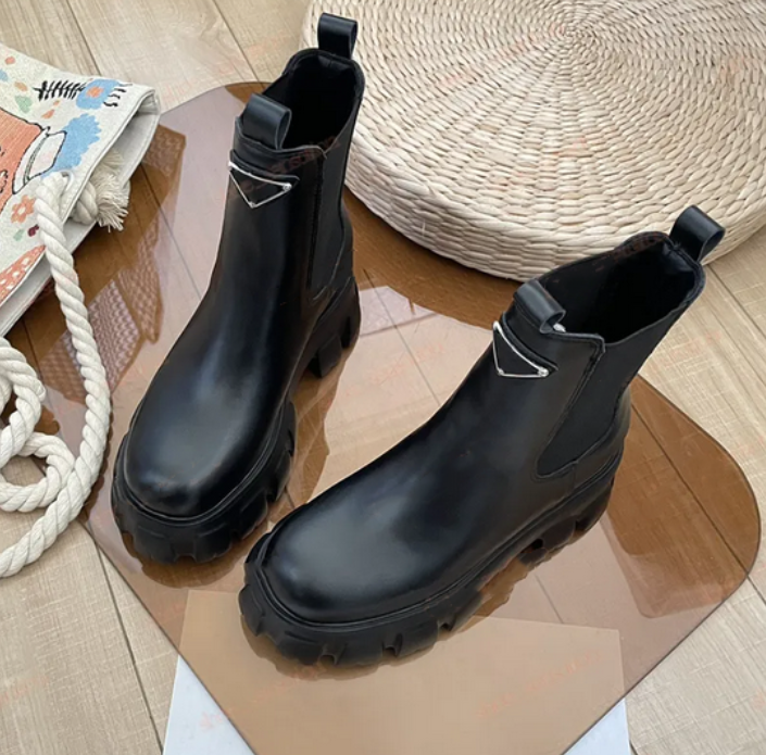 Botas de suela gruesa con faceta triangular negra de diseñador para mujer, botas Martin altas de cuero auténtico para exteriores con punta redonda,