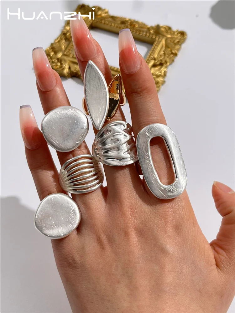 HUANZHI Chunky Sliver Color Rings for Women Men Elastic Rope Connection Irregular Geometric Hollow Matte Fashion Trend Jewelry 260605