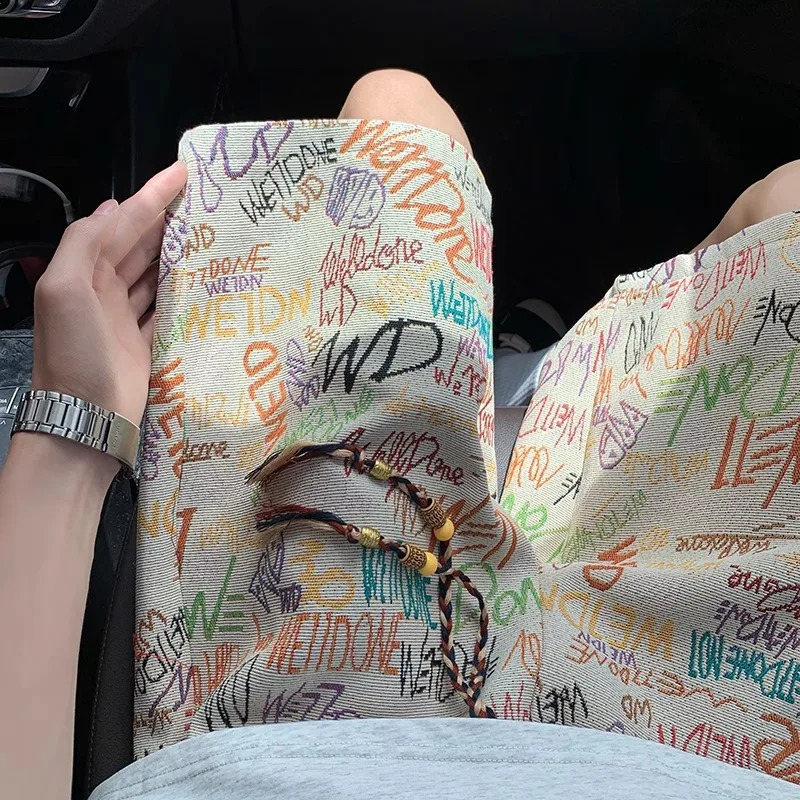 Letter graffiti knitted shorts mens summer thin fashion full print pants beach vacation five quarter pants 260609BJ
