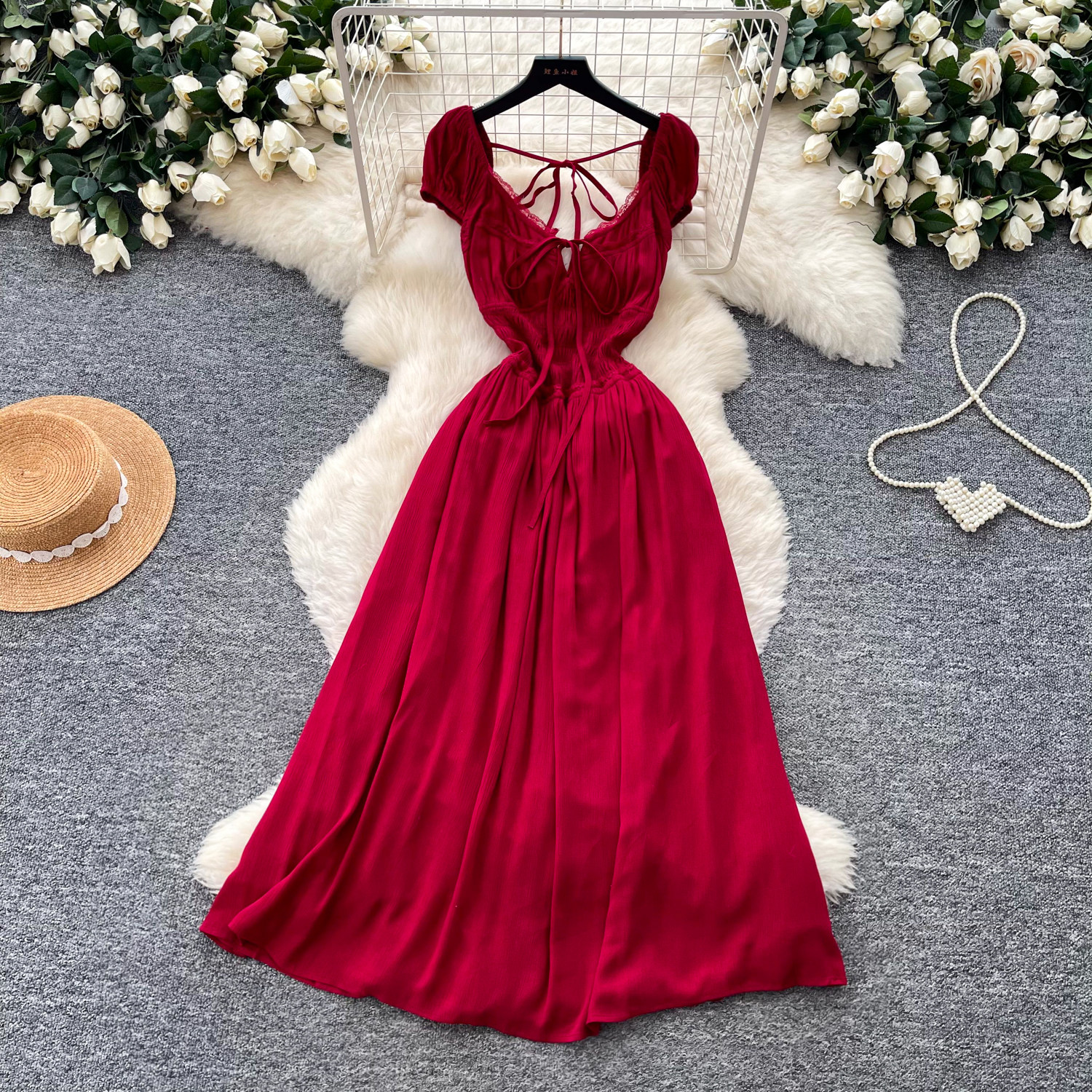 French red suspender royal sister fan dress women's summer backless hollow and thin temperament holiday style A-shaped skirt