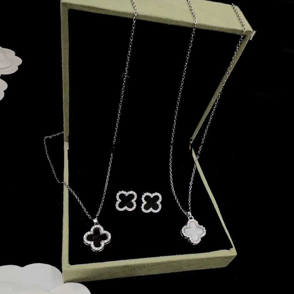 Designer Necklace Black and white double-sided four-leaf clover necklace titanium steel non-fading womens summer necklace and earring set JEMR