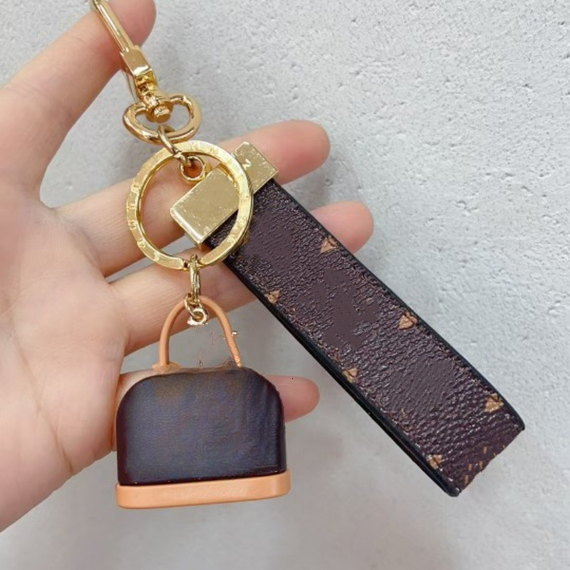 Key Rings Keychains Buckle lovers Car Handmade Leather Keychains Men and Women bag Pendant Fashion Accessories Mini Handbags Charms Designer Leather
