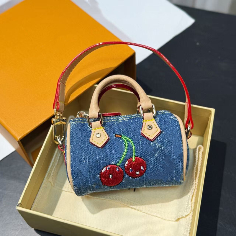 New Style Designer keychains TM MICRO SPEED DENIM CERISE Mini Wallets Embroidered Leather Coin Purse Brand Womens Bag Charm Keyring Mens Key Chains