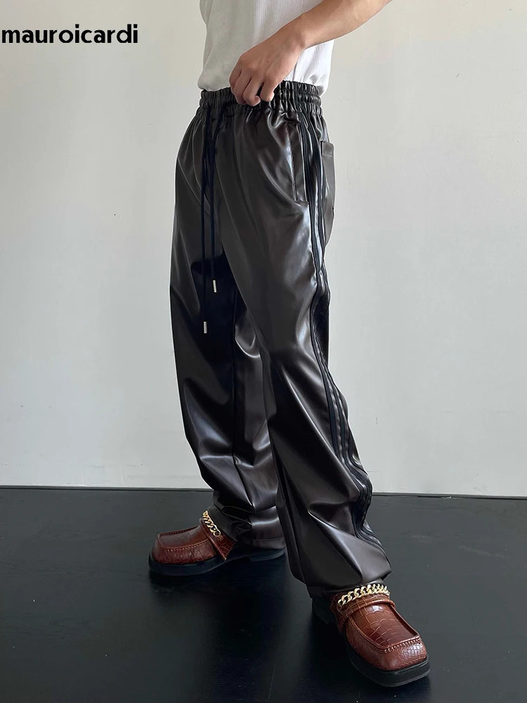 Mauroicardi Spring Autumn Cool Black Soft Stretchy Waterproof Pu Leather Pants for Men with Elastic Waist Loose Casual Clothes 260611