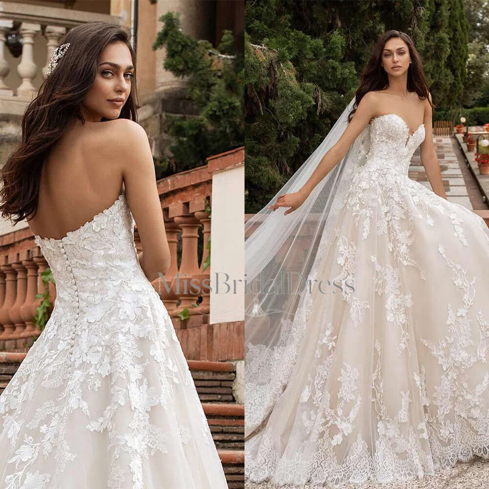 Elegant Ball Gown Wedding Dresses Sexy Sweetheart Backless Appliques Lace Bridal Gowns Custom Made Sweep Train Robe De Mariee Mb612