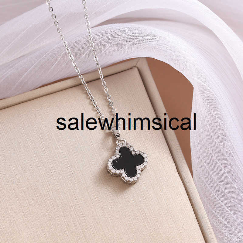 Designer Necklace Black and white double-sided four-leaf clover necklace titanium steel non-fading womens summer necklace and earring set W452
