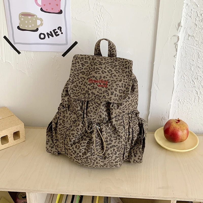 Y2K Leopard Print Drawstring Backpack Women Large Capacity Casual Flap Rucksack Embroidery Letter School Travel Daypack 260611