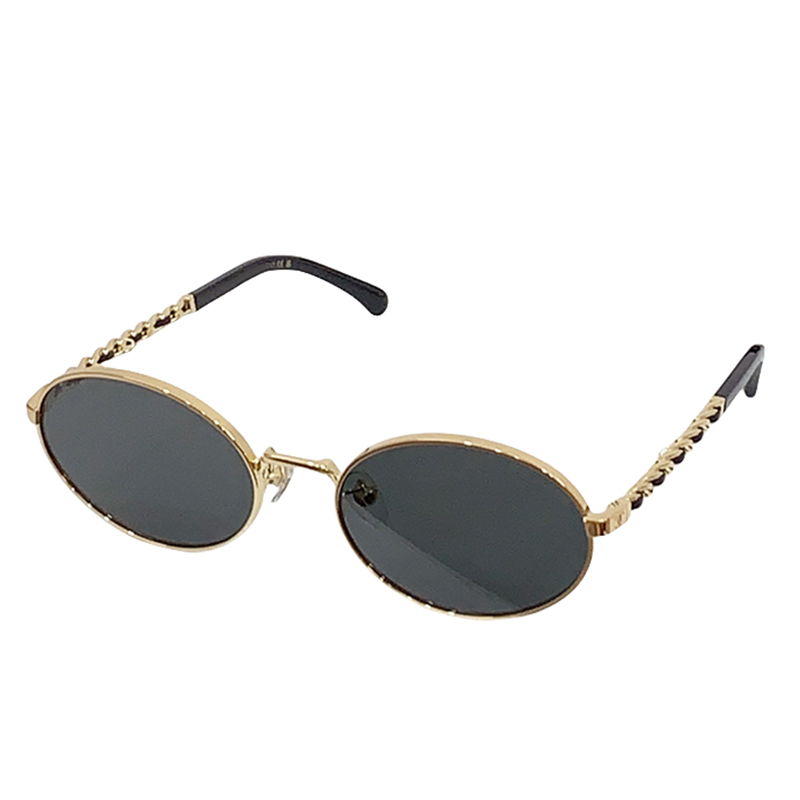 Minimalist Thin Gold Oval Sunglasses Twisted Chain Metal Temples Solid Dark Grey UV400 Lens Retro Y2K Women Vacation Shades