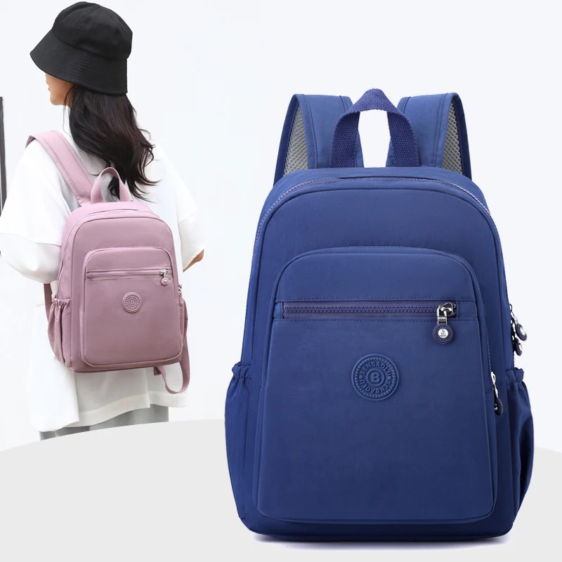 Largecapacity backpack lightweight and fashionable versatile travel student schoolbag womens casual bag 260605